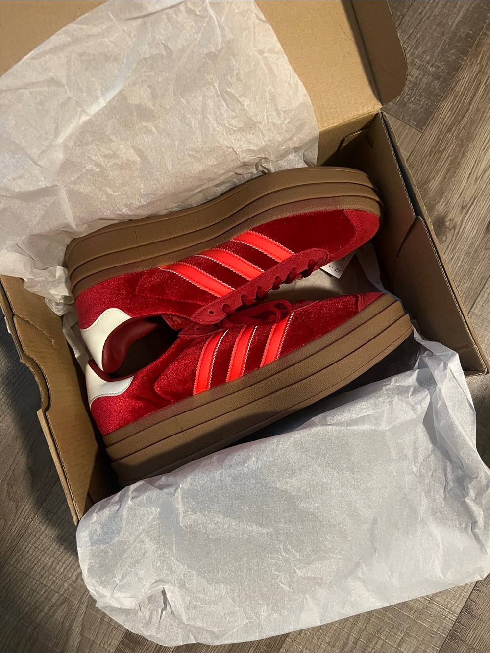 Red adidas gazelle